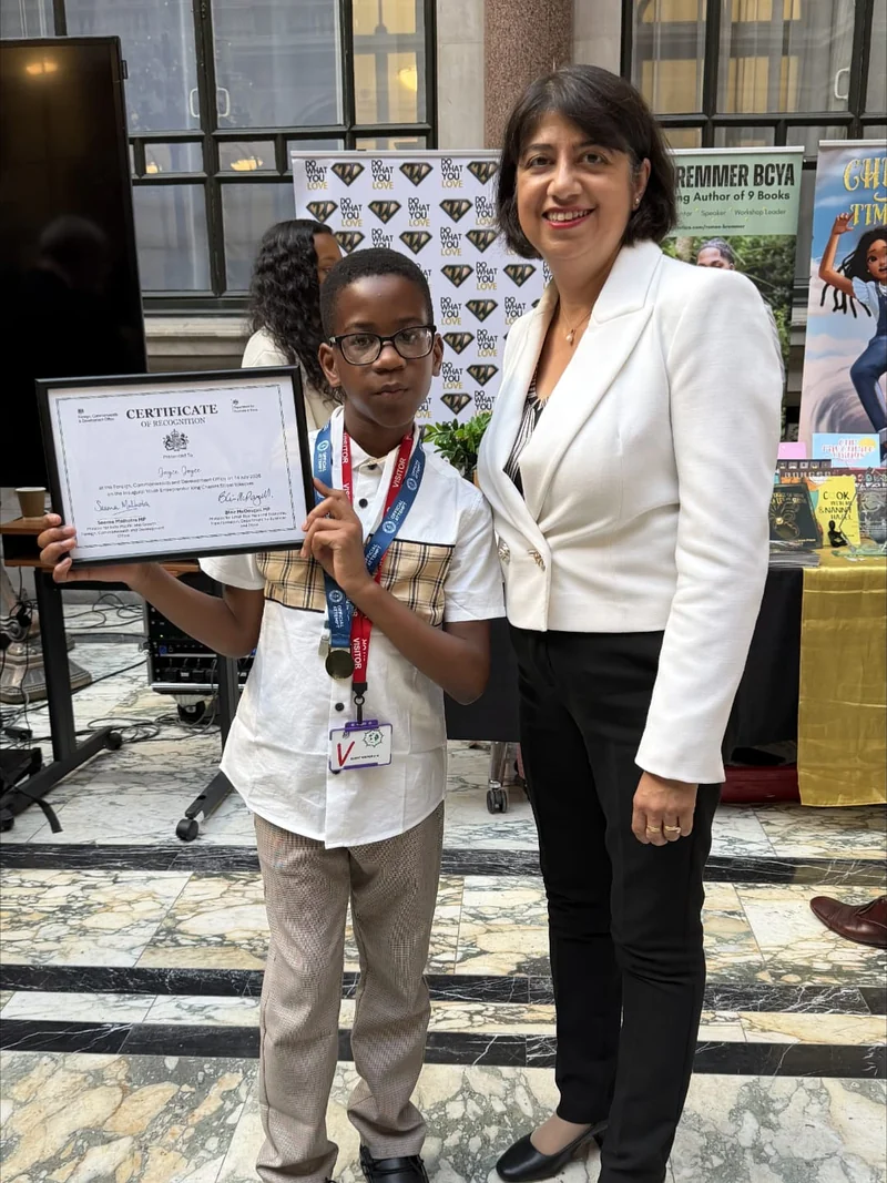 Jayce Joyce receiving his Certificate of Recognition from the Foreign, Commonwealth & Development Office